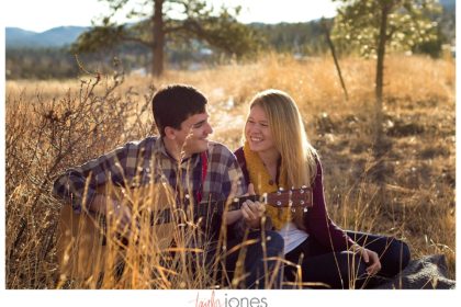 2015-02-23_0007 Couple sitting in a field playing guitar