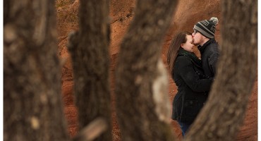 BW09 Through the trees at Red Rocks engagement shoot