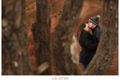 BW09 Through the trees at Red Rocks engagement shoot