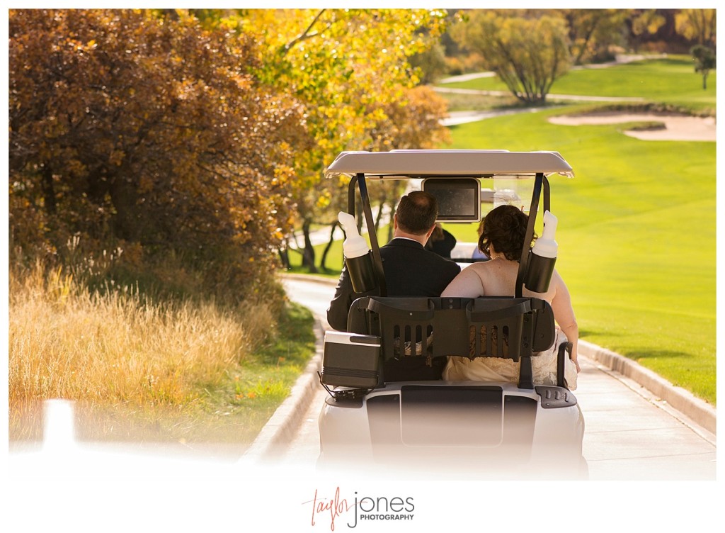 Couple in golf carts at Arrowhead Golf Course wedding