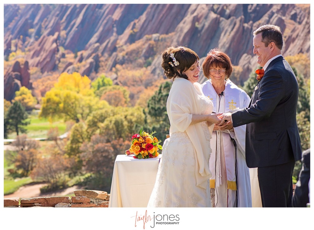 Exchanging of rings at Arrowhead Golf Course wedding ceremony in the fall