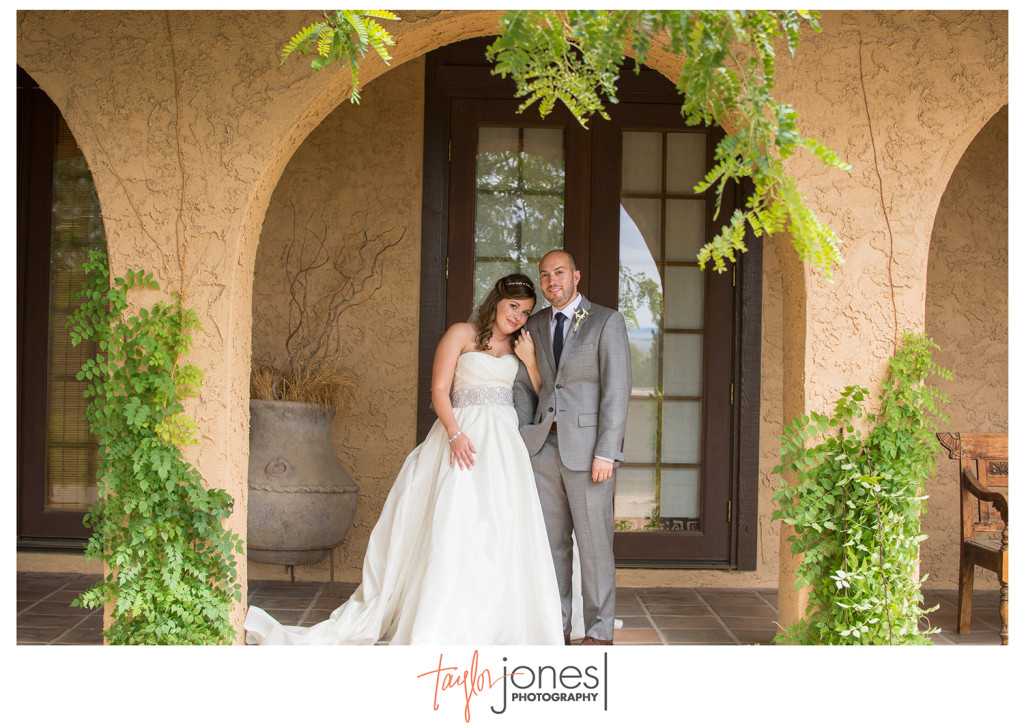 Bride and groom in arches at Villa Parker