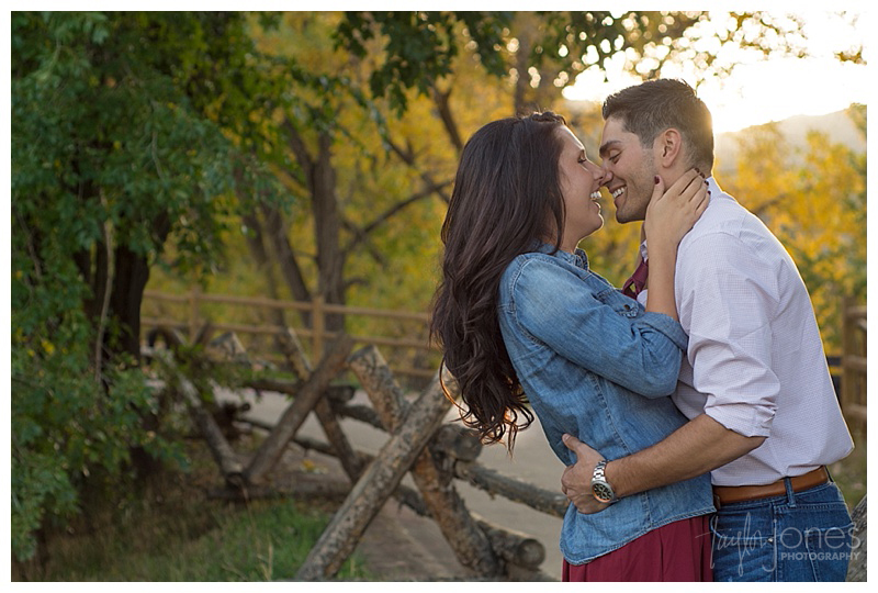 Golden Colorado engagement and wedding photographer, engagement shoot at Clear Creek Historic Park in downtown Golden, fall engagement shoot, couple giggling