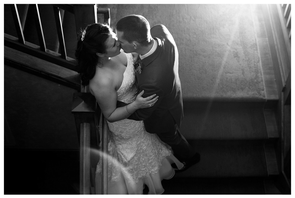 Bride and groom in staircase at Reception at Mount Vernon Country Club Wedding