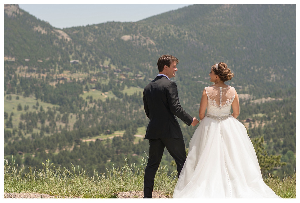 First look with bride and groom in mountains at YMCA of the Rockies in Estes Park, Colorado