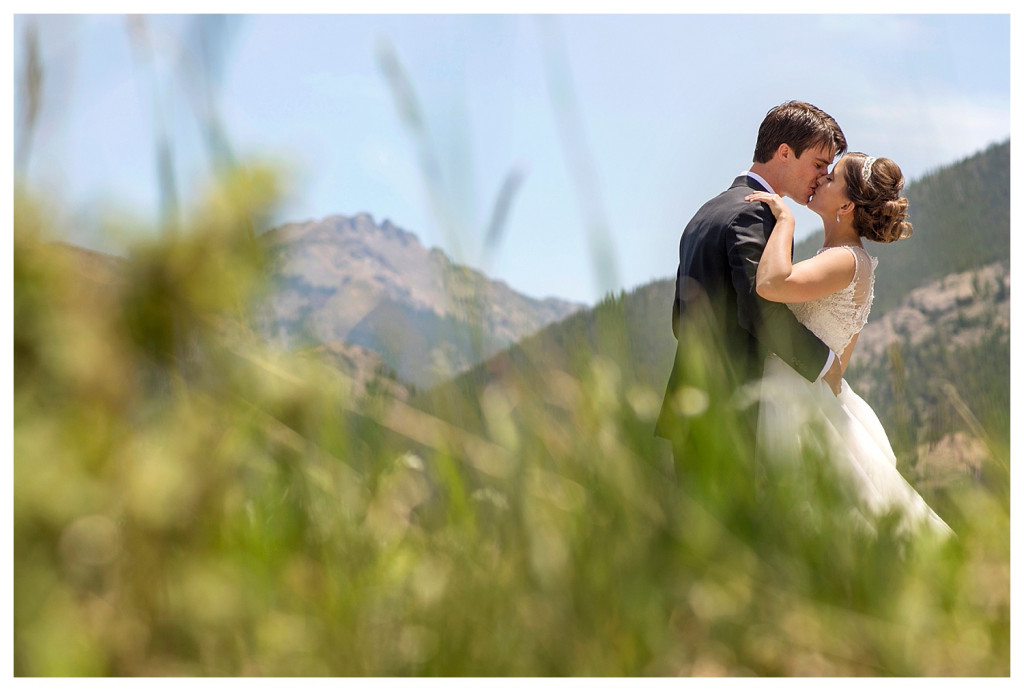 First look with bride and groom in mountains at YMCA of the Rockies in Estes Park, Colorado