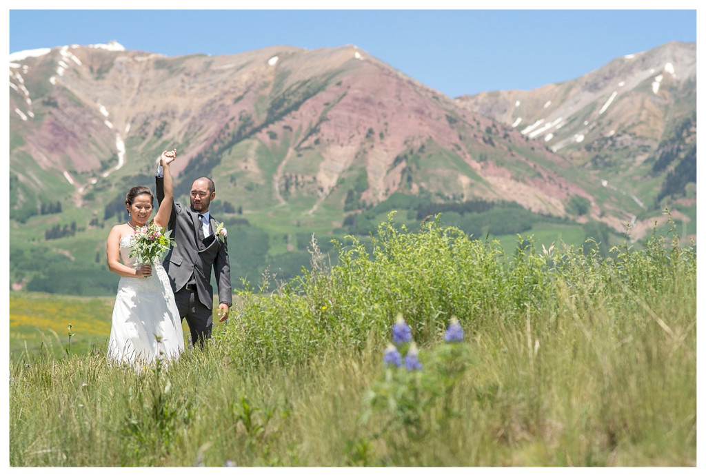 Crested Butte Wedding Photographer with wildflowers