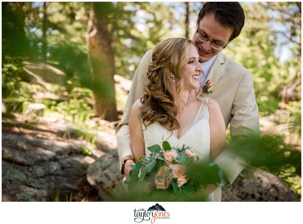 Evergreen Red Barn wedding first look with bride and groom