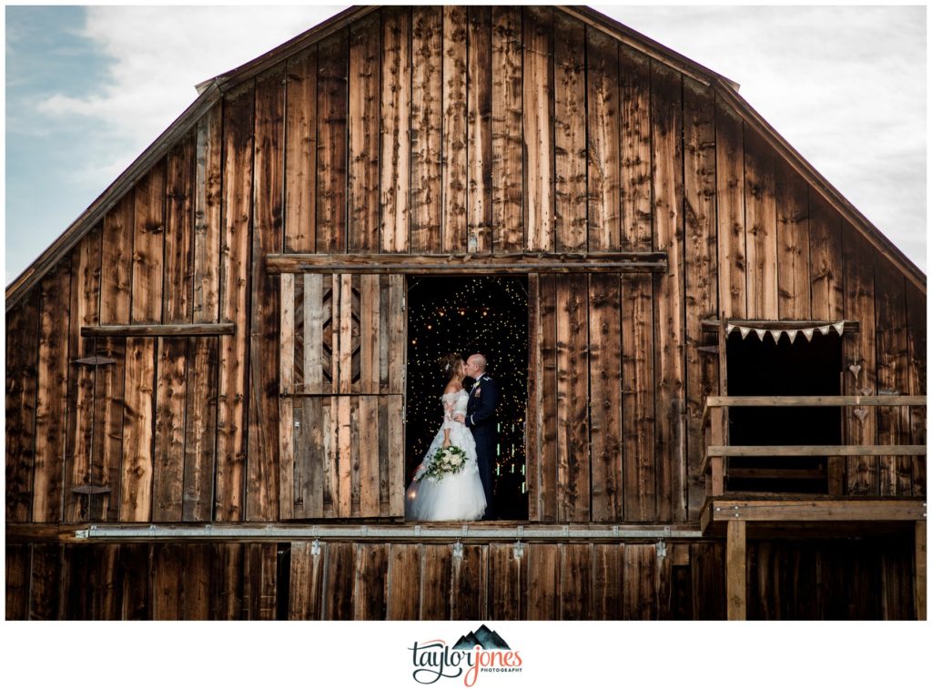 Winding River Ranch Wedding of Mike and Melissa wedding bride and groom couple portraits in barn