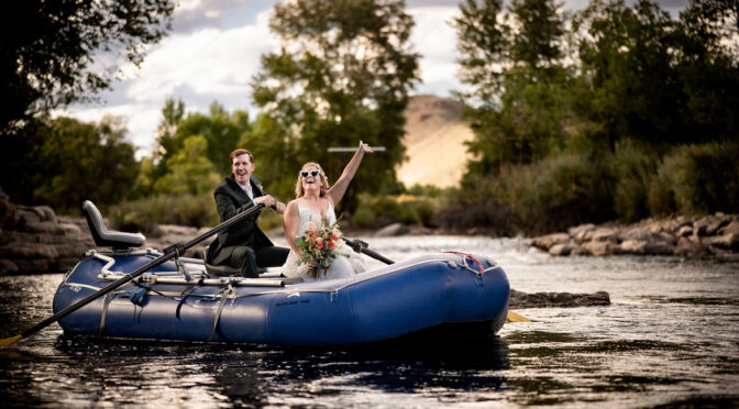 Couple in raft at their wedding at the Salida SteamPlant in Colorado