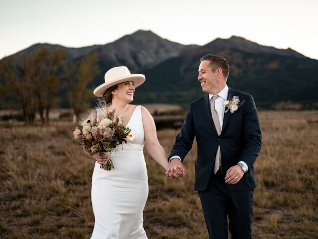 Couple at the Barn at Sunset Ranch barn wedding venue in Buena Vista, Colorado